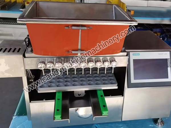 Automatic small scale lollipop making machine